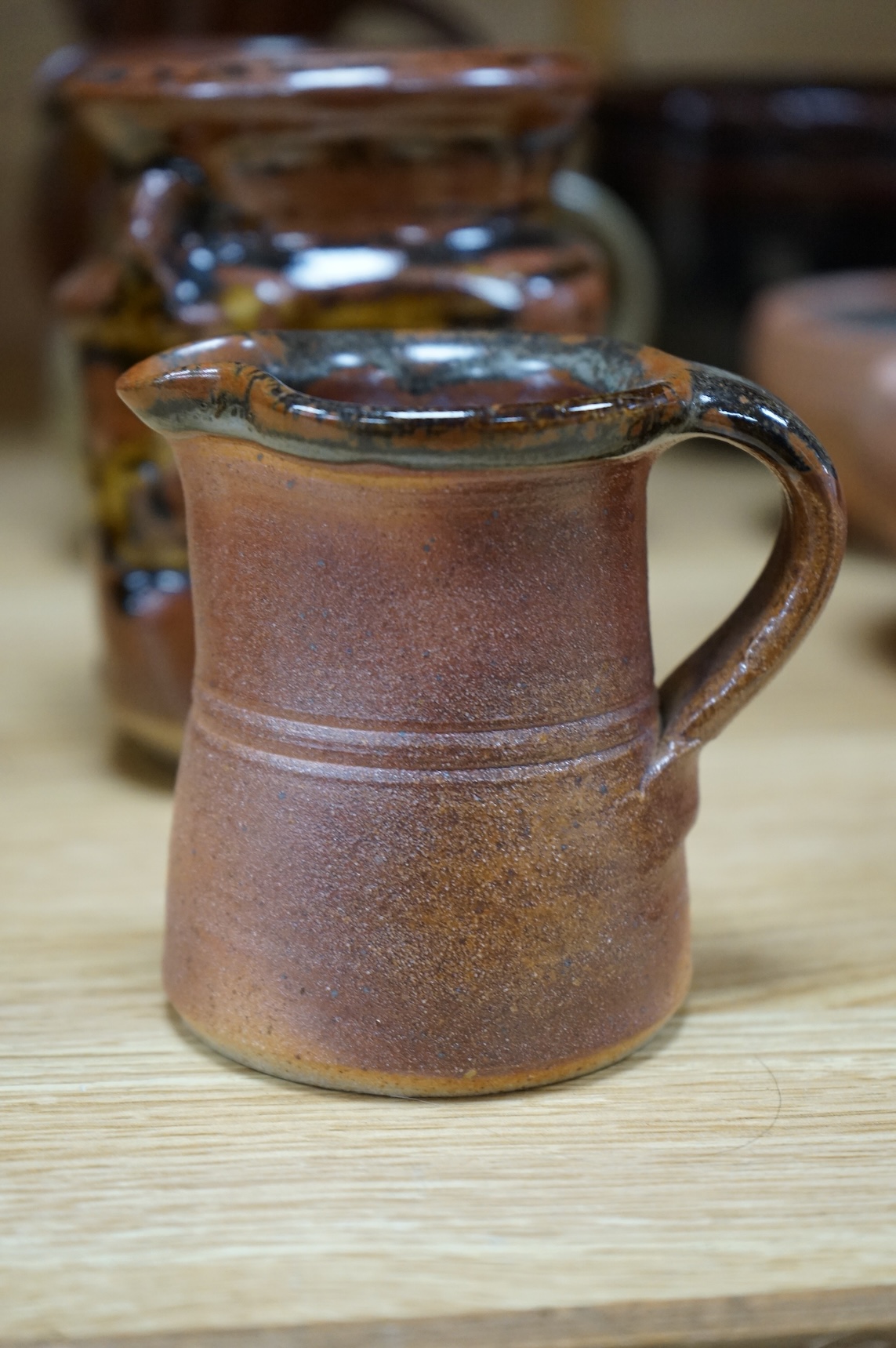 A large group of 20th century signed and unsigned Studio pottery, tallest 23cm high